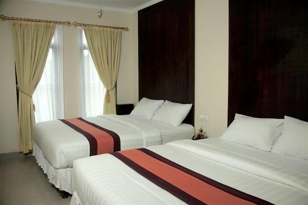 จิมบารัน เลสตารี โฮเต็ล แอนด์ เรสซิเดนซ์ Hotel จิมบาราน ภายนอก รูปภาพ